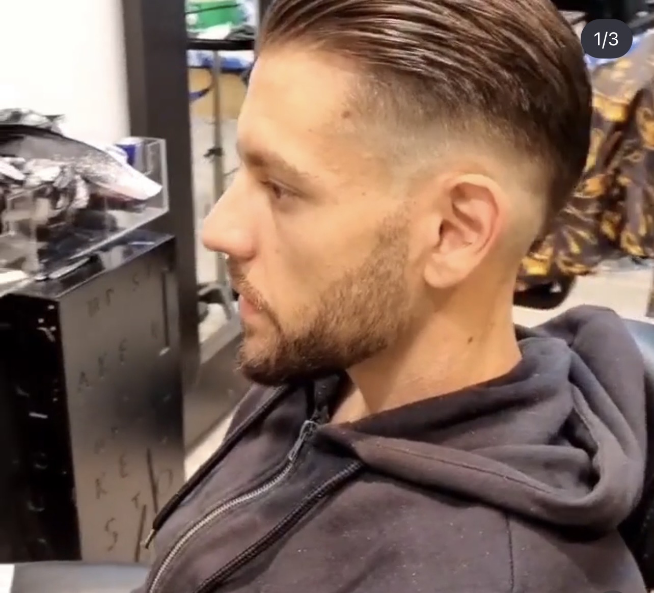 Efter klippning — skarp fade och slick back